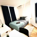 By La Boqueria Rooms